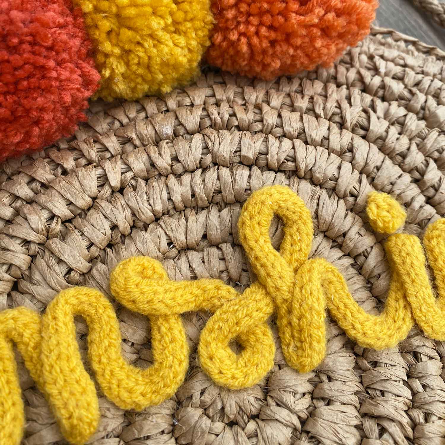 Borsa in paglia rotonda con scritta personalizzata