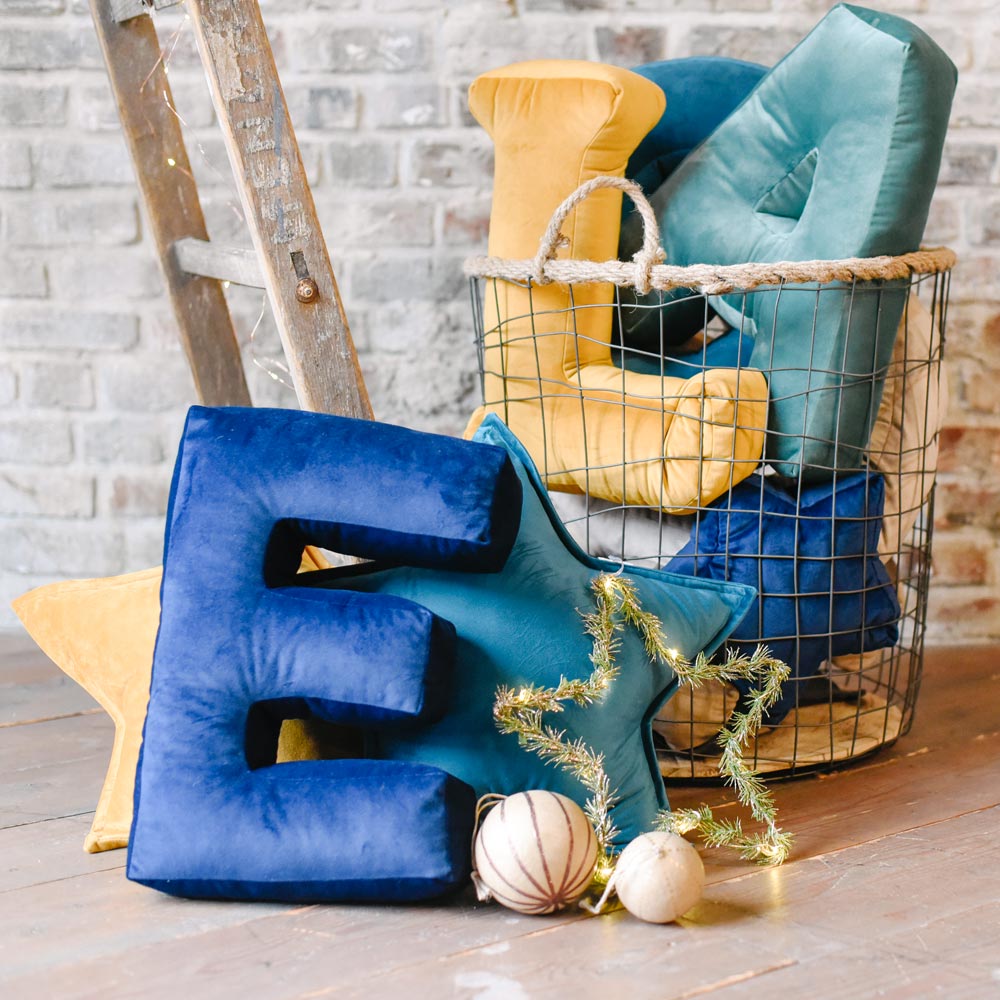 Cuscino a forma di stella in velluto petrolio