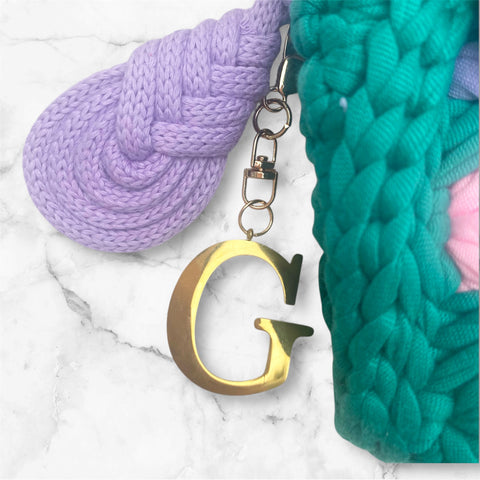 Borsa Odette righe fluo con iniziale