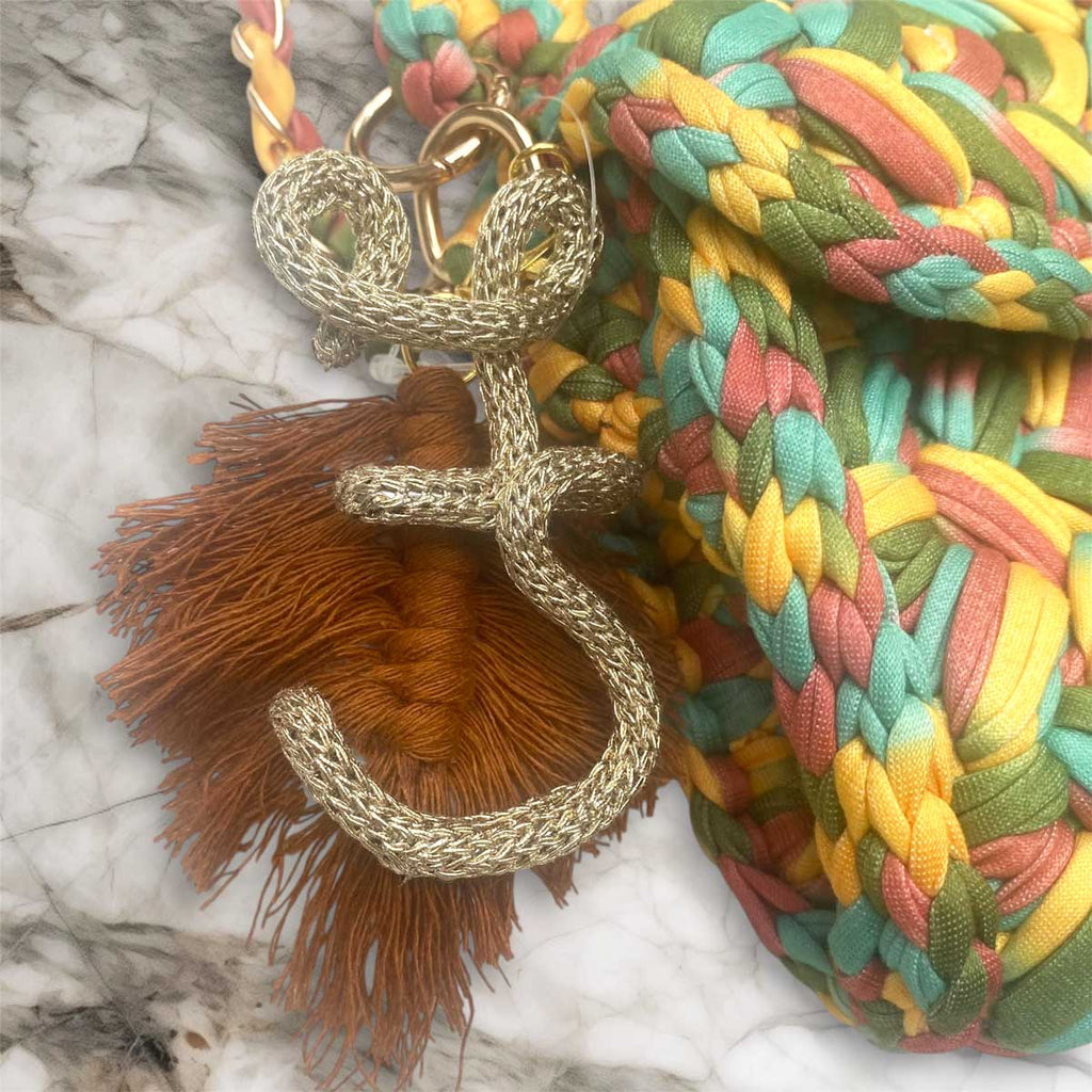 Borsa in fettuccia personalizzata con ciondolo iniziale Odette multicolor verde