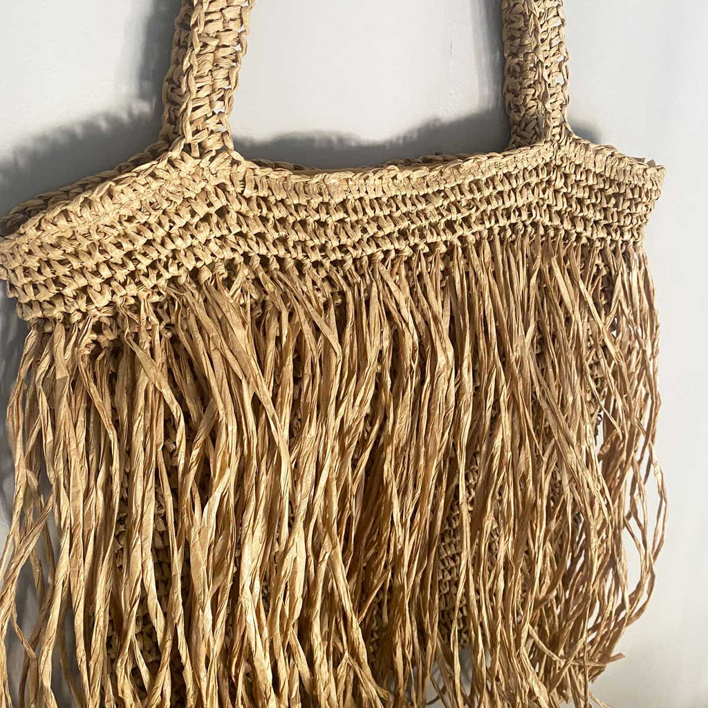 Borsa grande da spiaggia in paglia intrecciata con frange