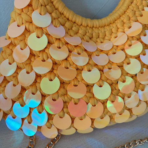 Ring bag all'uncinetto arancione con paillettes