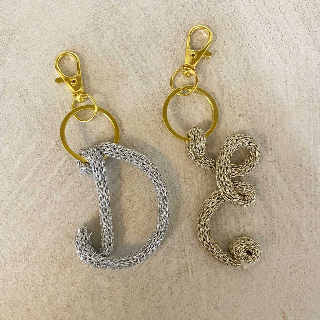 Borsa Odette malva con iniziale
