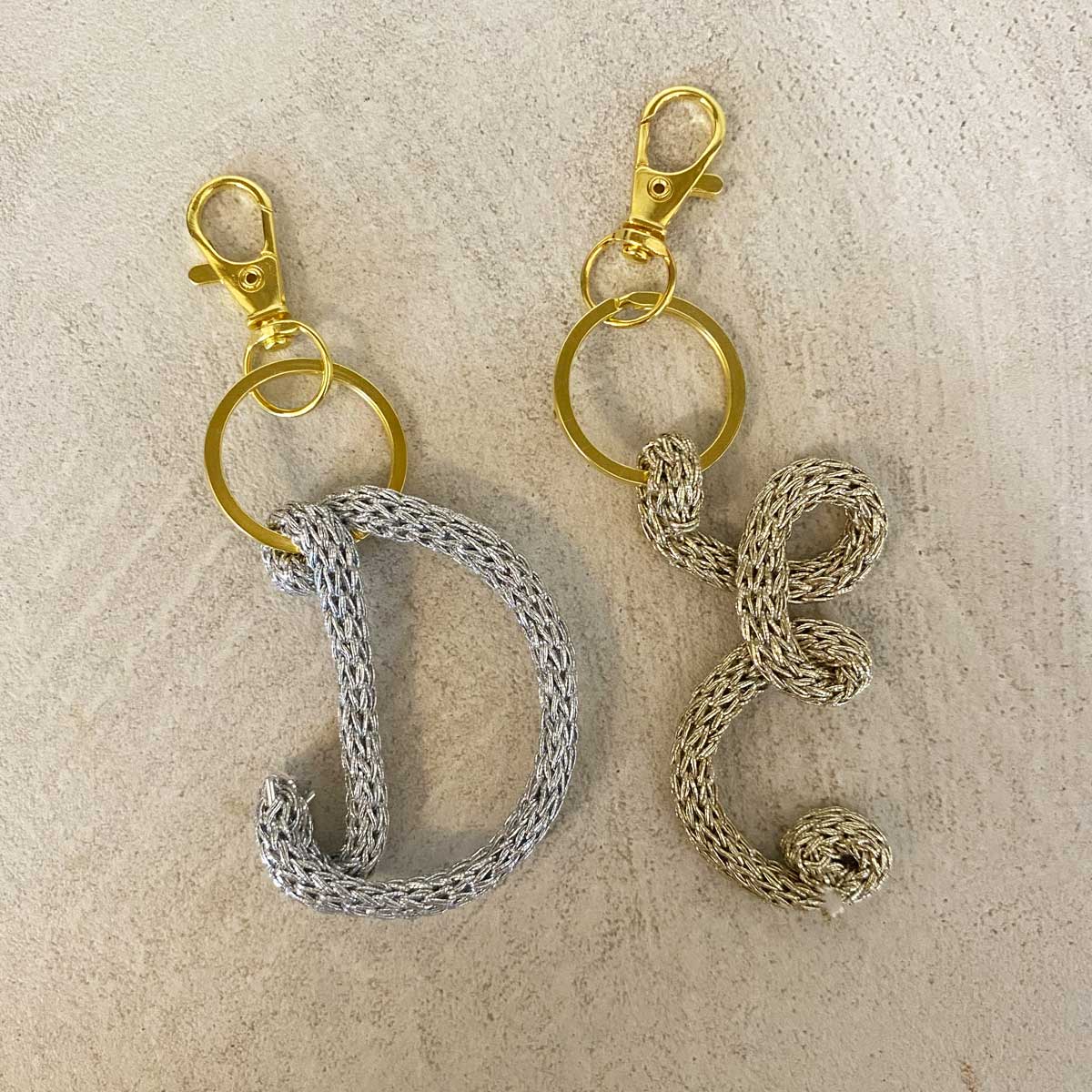 Borsa Odette malva con iniziale