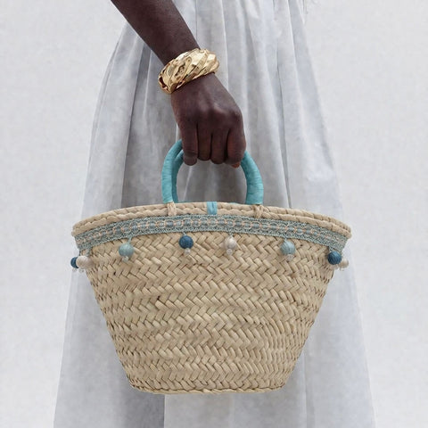 Borsa in paglia Zagara con pon pom turchesi