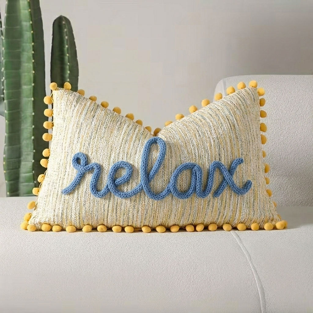 Cuscino giallo con pon pom con nome o scritta personalizzata ricamata