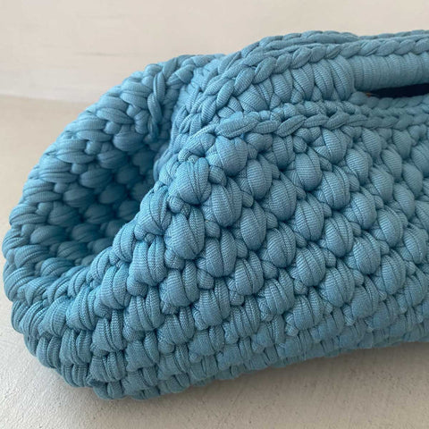 Maxi clutch all'uncinetto carta da zucchero