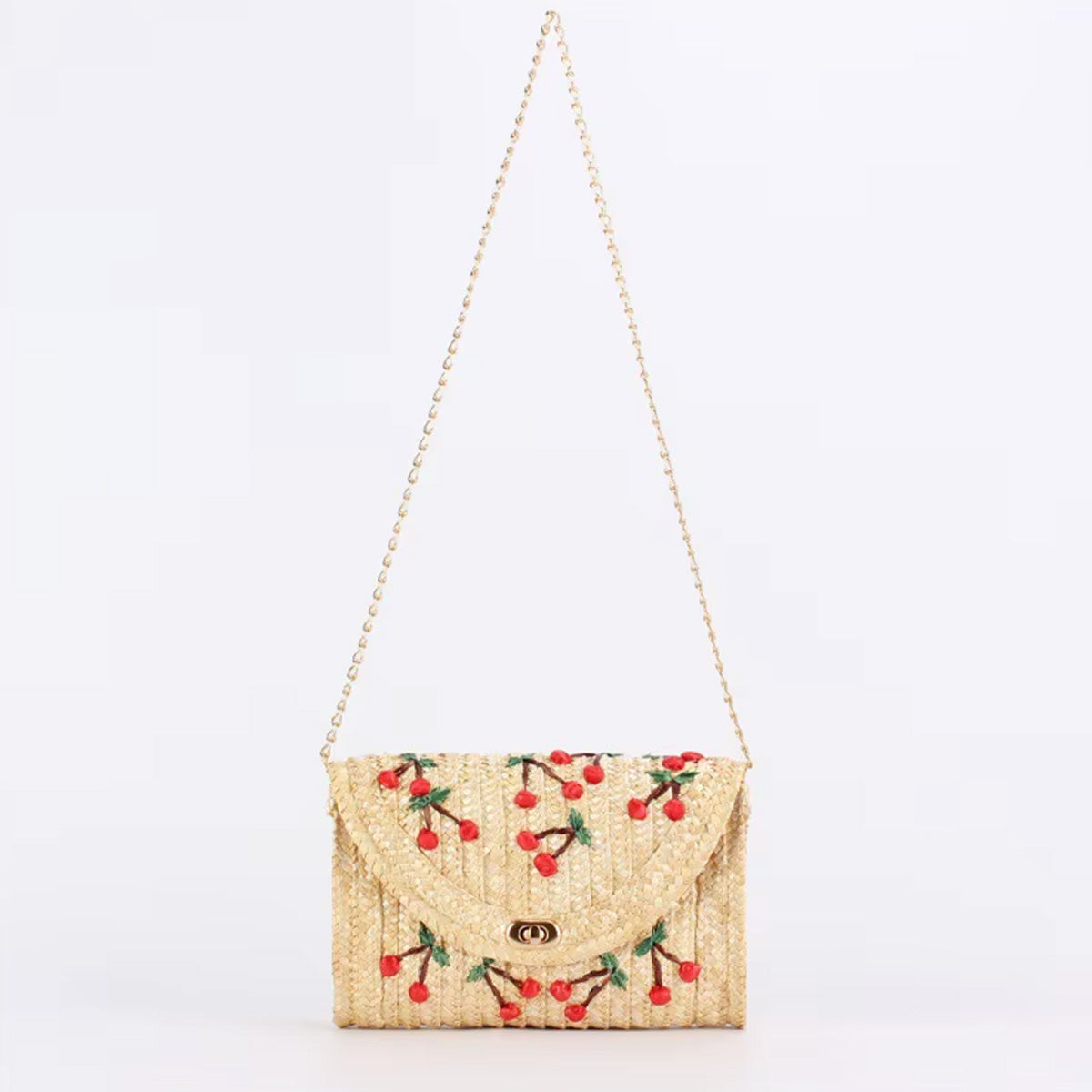 Pochette in paglia naturale con ciliegie ricamate
