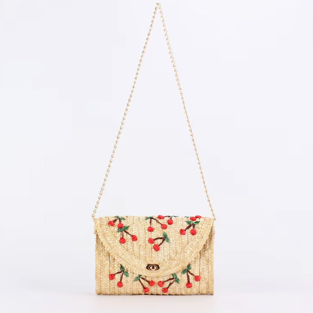 Pochette in paglia naturale con ciliegie ricamate
