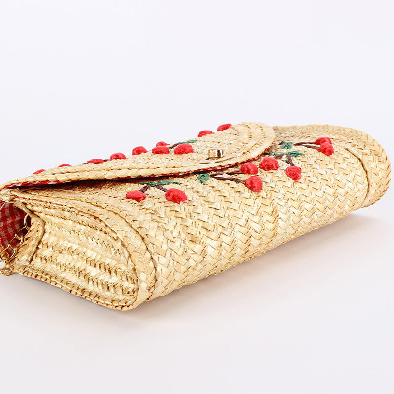 Pochette in paglia naturale con ciliegie ricamate