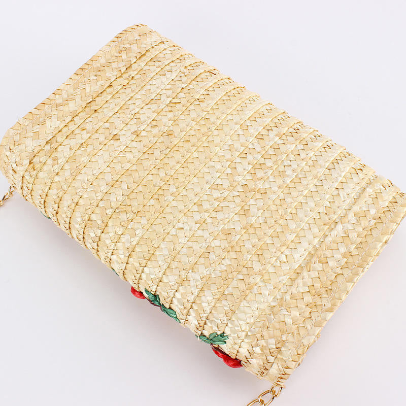 Pochette in paglia naturale con ciliegie ricamate