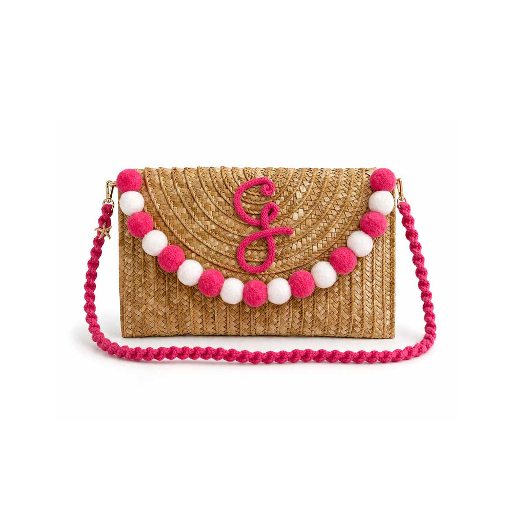 Pochette in paglia Ibiza con scritta personalizzata e pon pom bianchi/rosa