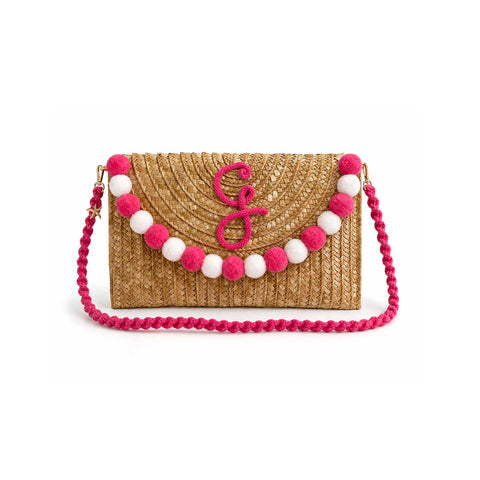 Pochette in paglia Ibiza con scritta personalizzata e pon pom bianchi/rosa
