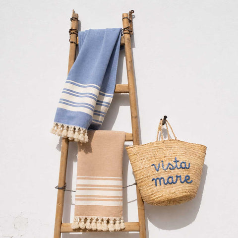 Fouta in cotone con lato in spugna celeste