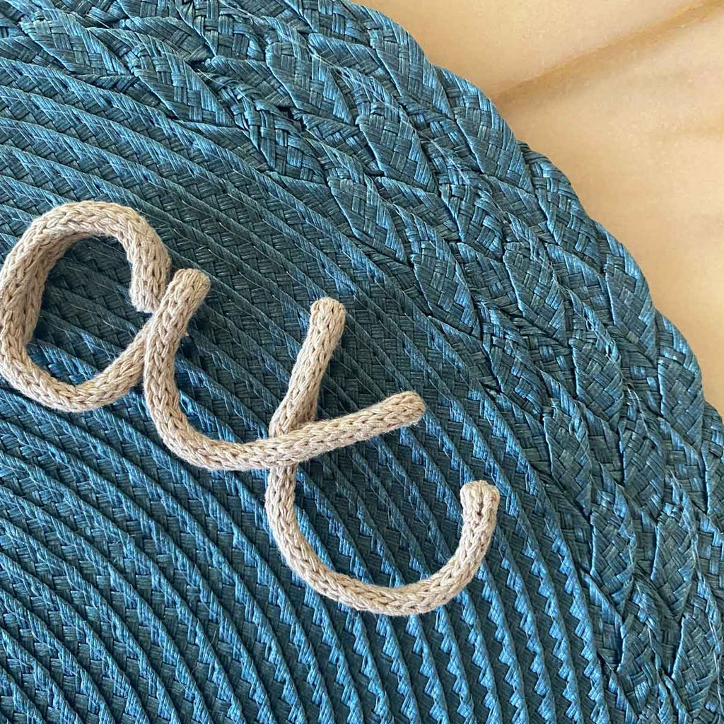 Tovaglietta personalizzata con nome verde petrolio con intreccio